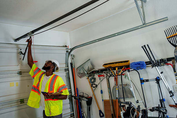 Professional Garage Door Panel Replacement technician working in Huber Ridge, OH